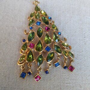 P.D: design multi color Christmas tree with rhinestones.